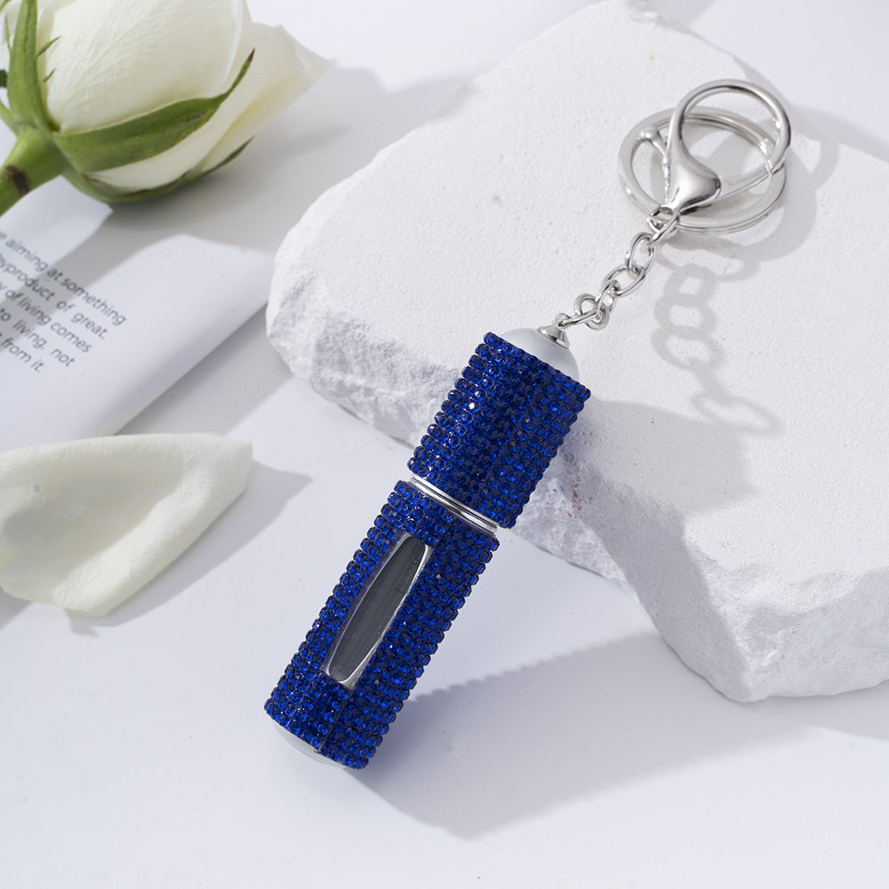 Wholesale  diamond-studded creative perfume bottle keychain is easy to carry